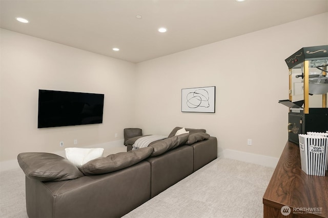 living area featuring carpet flooring, recessed lighting, and baseboards