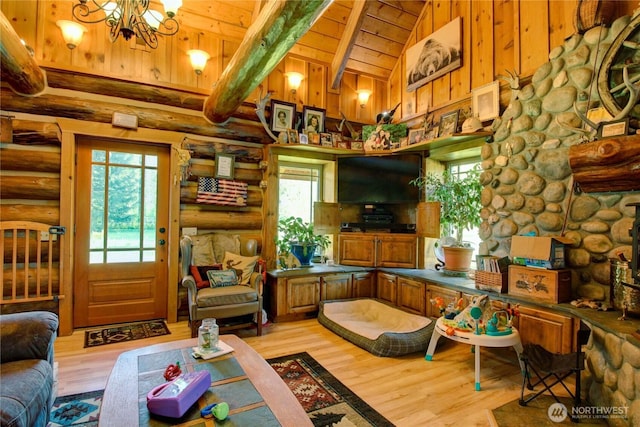 53932 Rockport Cascade Rd, Rockport, WA 98283 - living room with light wood finished floors, rustic walls, beamed ceiling, wood ceiling, and high vaulted ceiling