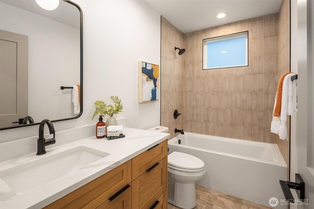 bathroom with bathtub / shower combination, vanity, toilet, and recessed lighting