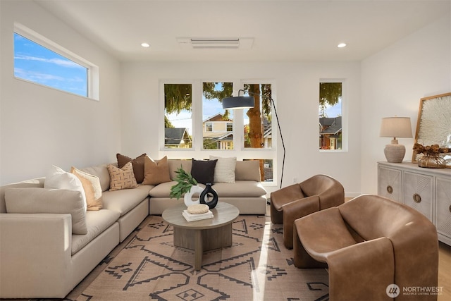living area featuring recessed lighting