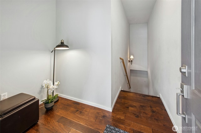 5589 Lakemont Blvd SE Unit 1702, Bellevue, WA 98006 - corridor with an upstairs landing, hardwood / wood-style floors, and baseboards
