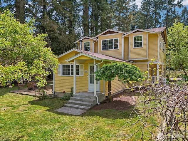 view of front of home with a front lawn