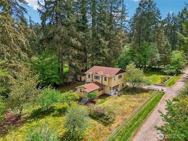 view from above of property featuring a forest