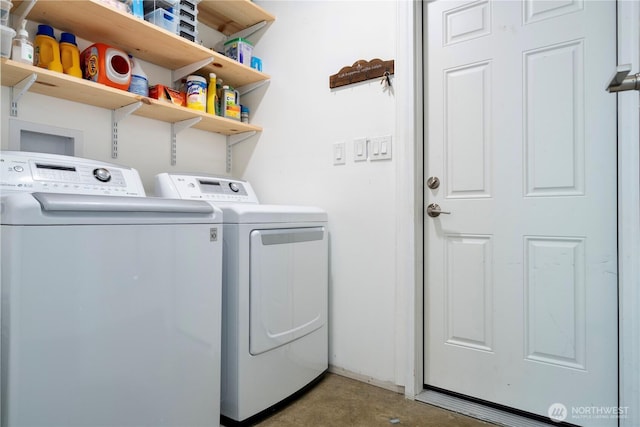 laundry area with independent washer and dryer