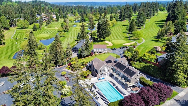 bird's eye view of a nearby body of water and a golf club