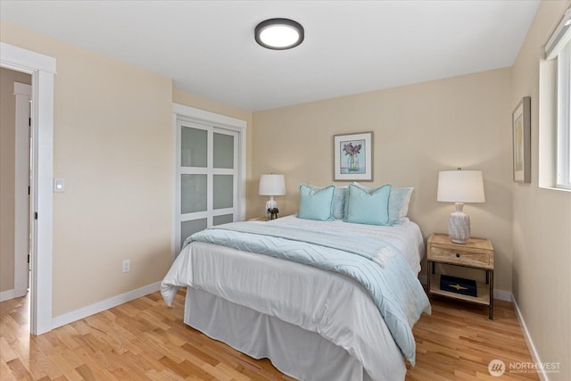 7344 125th Pl SE, Newcastle, WA 98056 - bedroom featuring light wood finished floors and baseboards