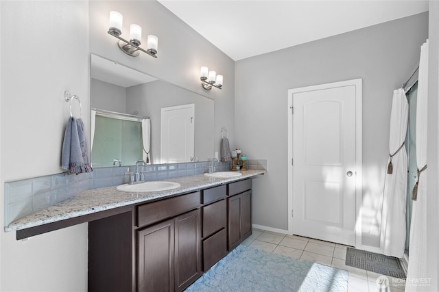 11511 SE 244th, Kent, WA 98030 - full bath featuring double vanity, tile patterned flooring, an enclosed shower, and baseboards