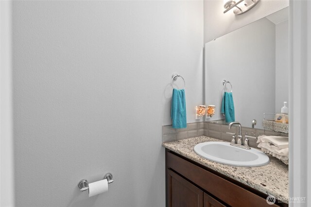 11511 SE 244th, Kent, WA 98030 - bathroom featuring tasteful backsplash and vanity