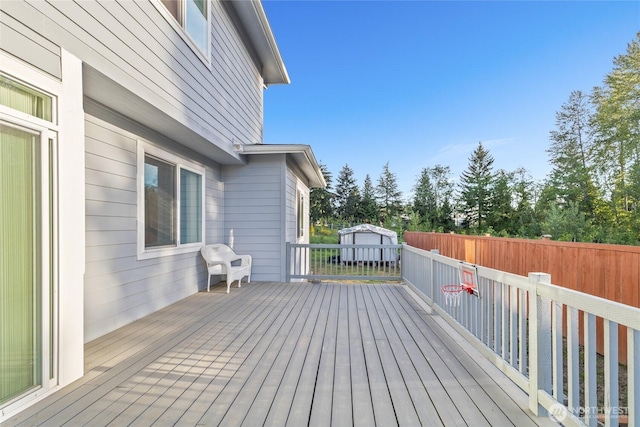 11511 SE 244th, Kent, WA 98030 - wooden deck with an outdoor structure, fence, and a storage shed
