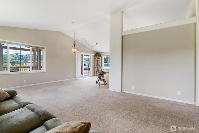 154 Mossyrock Rd W Unit 5, Mossyrock, WA 98564 - carpeted living room with baseboards and vaulted ceiling