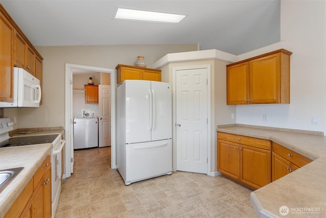 154 Mossyrock Rd W Unit 5, Mossyrock, WA 98564 - kitchen featuring white appliances, lofted ceiling, light countertops, brown cabinets, and light flooring