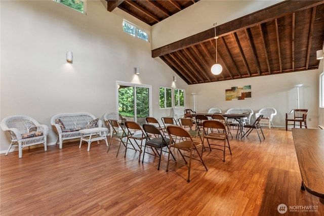 14651 NE 40th St Unit C4, Bellevue, WA 98007 - dining area featuring high vaulted ceiling, wooden ceiling, wood finished floors, beamed ceiling, and baseboards