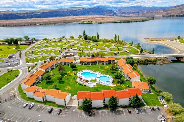8903 Crescent Bar Rd NW Unit 169, Quincy, WA 98848 - drone / aerial view of a water and mountain view and a pool area