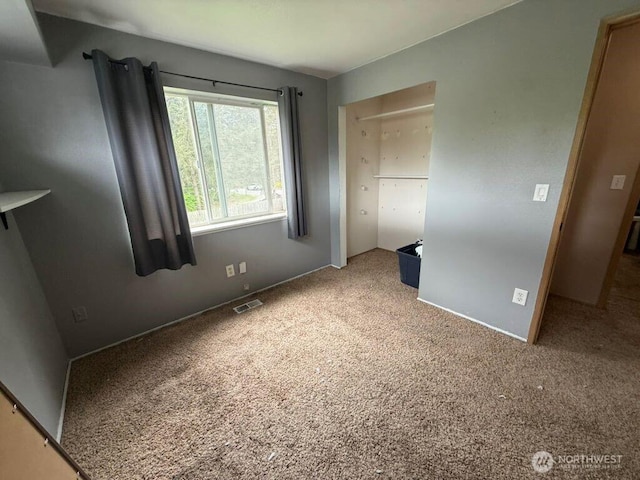21614 82nd Avenue Ct E, Spanaway, WA 68718 - unfurnished bedroom featuring carpet and baseboards