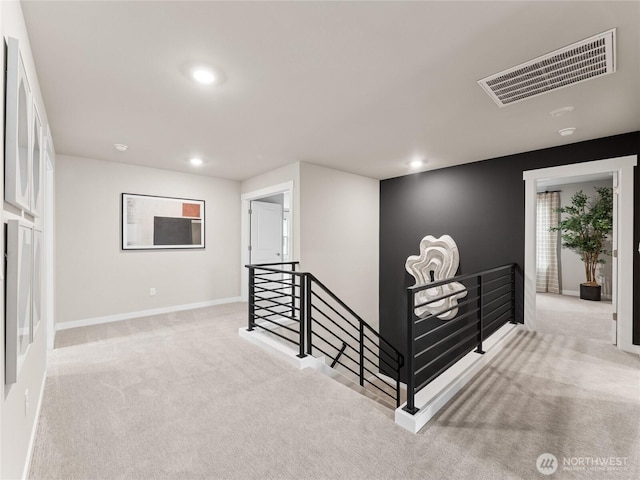 8302 114th Ave SE Unit 29, Newcastle, WA 98056 - hall with an upstairs landing, carpet, and recessed lighting