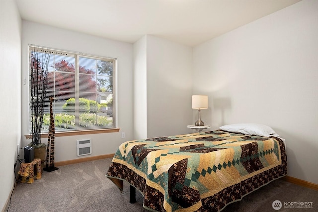 bedroom featuring carpet floors, multiple windows, and baseboards