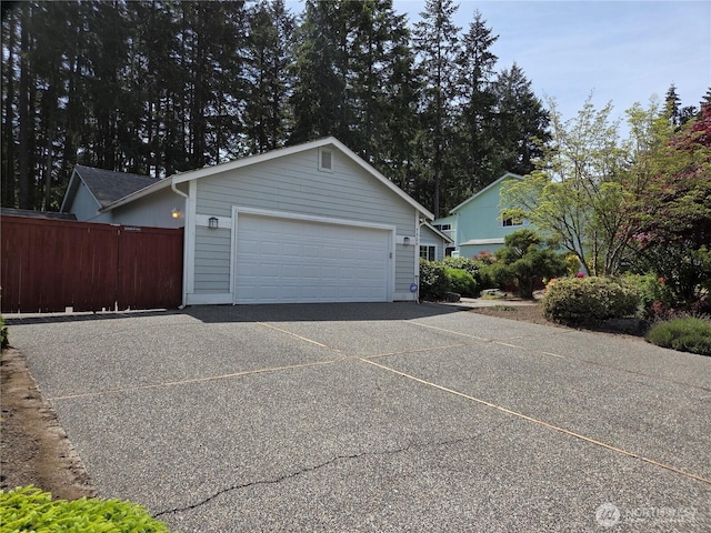 7509 43rd Ave SE, Lacey, WA 98503 - garage with fence and driveway