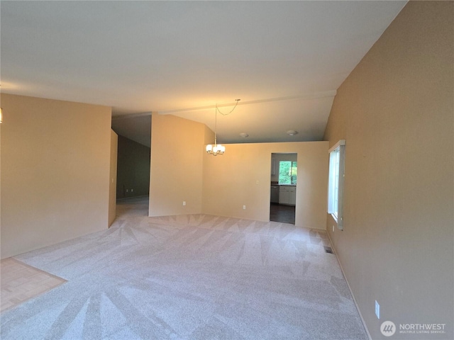 7509 43rd Ave SE, Lacey, WA 98503 - spare room featuring a chandelier and light carpet
