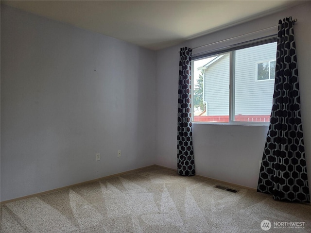 7509 43rd Ave SE, Lacey, WA 98503 - carpeted empty room featuring baseboards