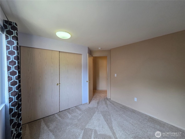 7509 43rd Ave SE, Lacey, WA 98503 - unfurnished bedroom featuring carpet floors and a closet