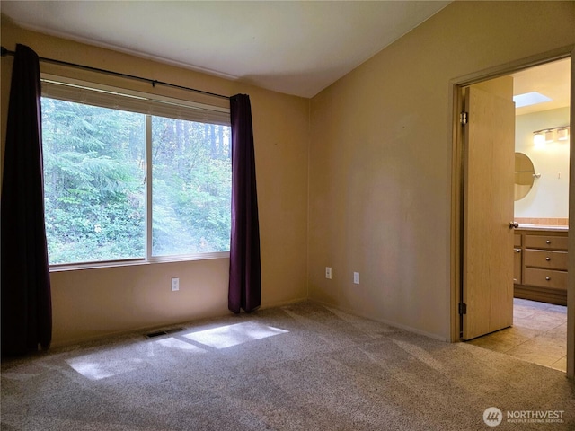 7509 43rd Ave SE, Lacey, WA 98503 - unfurnished room with healthy amount of natural light and light colored carpet