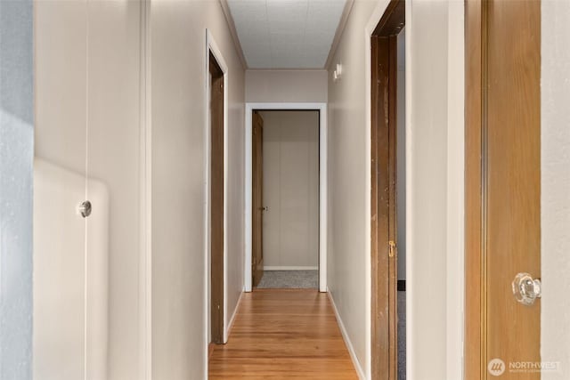 1250 N Broadway St, Aberdeen, WA 98520 - hallway featuring light wood-type flooring and baseboards
