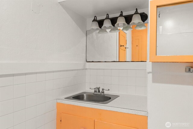 1250 N Broadway St, Aberdeen, WA 98520 - bathroom with vanity and tasteful backsplash