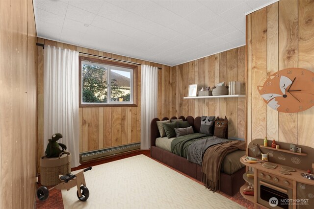 1250 N Broadway St, Aberdeen, WA 98520 - bedroom featuring a baseboard heating unit and wooden walls