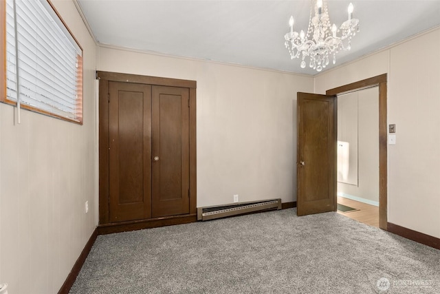 1250 N Broadway St, Aberdeen, WA 98520 - unfurnished bedroom featuring a baseboard heating unit, carpet, a chandelier, and ornamental molding