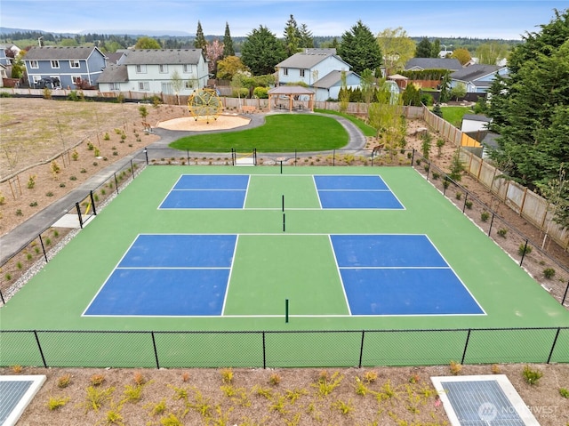 28203 74th Dr NW Unit 82, Stanwood, WA 98292 - view of tennis court featuring a residential view, fence, and a gazebo
