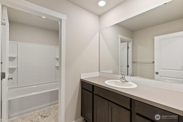 28203 74th Dr NW Unit 82, Stanwood, WA 98292 - bathroom with vanity, baseboards, shower / washtub combination, and recessed lighting