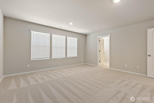 28203 74th Dr NW Unit 82, Stanwood, WA 98292 - unfurnished room featuring light colored carpet and baseboards