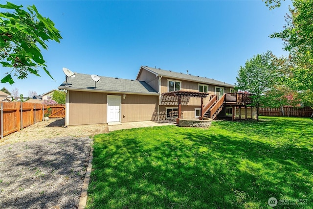 rear view of house featuring a pergola, a wooden deck, stairs, and a patio area