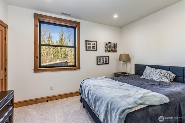 carpeted bedroom with baseboards and recessed lighting