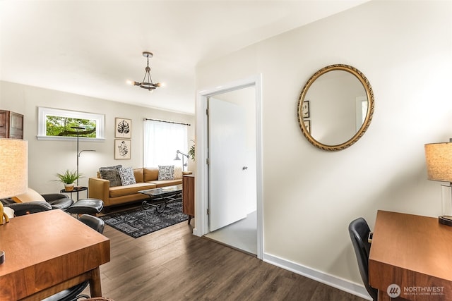 home office featuring dark wood-style flooring and baseboards