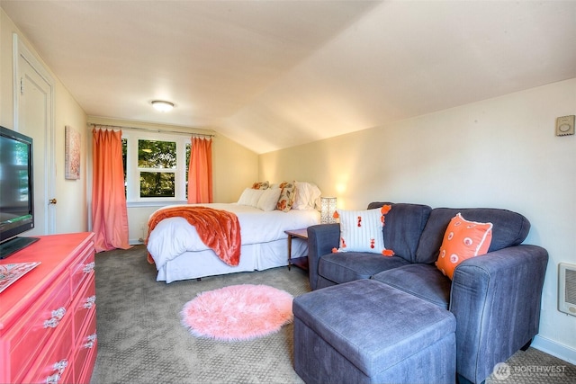 bedroom featuring carpet flooring and vaulted ceiling