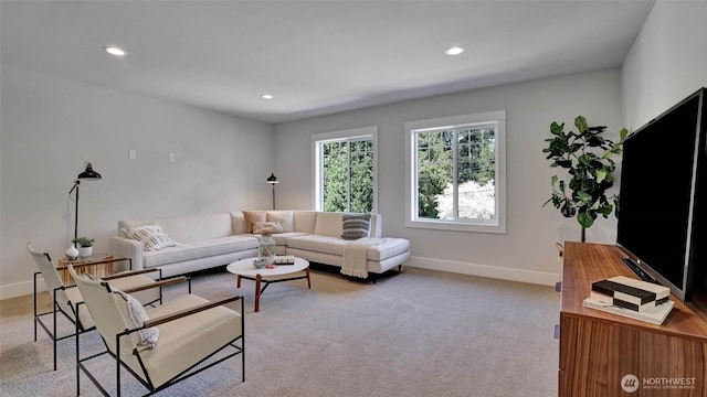 living area with light colored carpet, baseboards, and recessed lighting