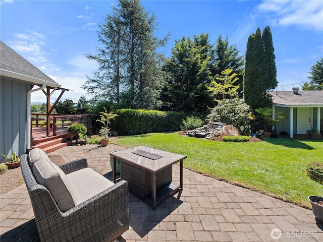 view of patio / terrace with a wooden deck