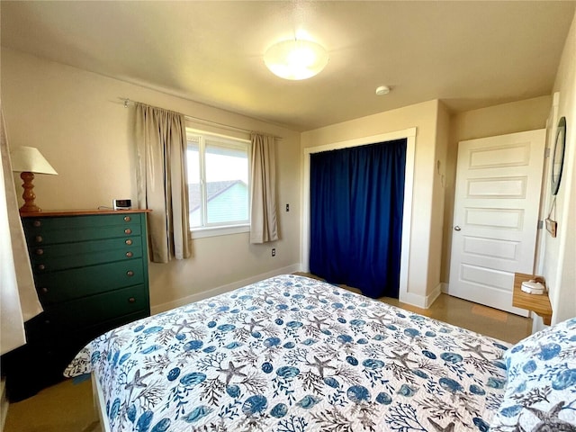 bedroom featuring baseboards