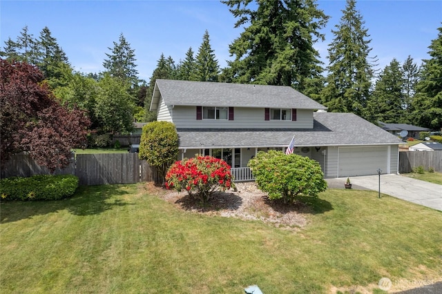 2505 Angela St SE, Lacey, WA 98503 - traditional-style home with a garage, driveway, a porch, and roof with shingles