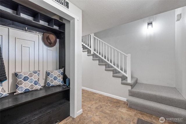 2505 Angela St SE, Lacey, WA 98503 - mudroom featuring baseboards