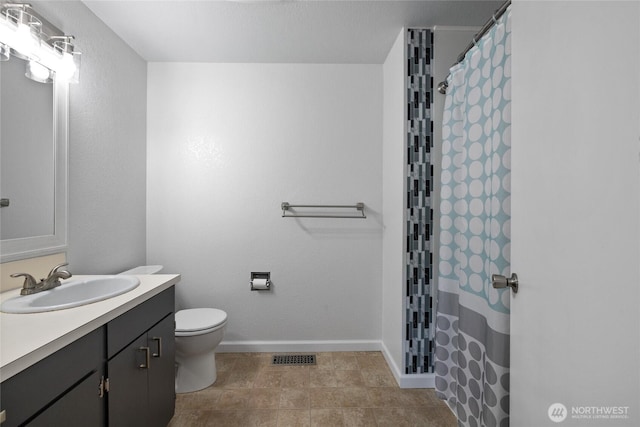 2505 Angela St SE, Lacey, WA 98503 - full bath featuring vanity, toilet, and baseboards