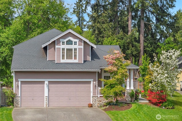 1401 241st St SE, Bothell, WA 98021 - view of front of property featuring driveway, stone siding, a front lawn, a shingled roof, and a garage