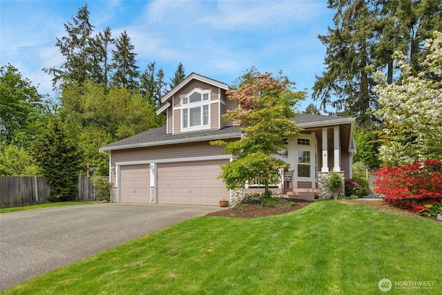 1401 241st St SE, Bothell, WA 98021 - view of front of house featuring driveway, stone siding, and an attached garage