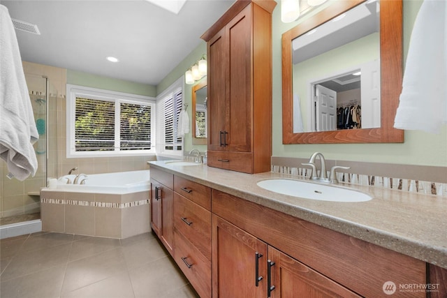 1401 241st St SE, Bothell, WA 98021 - full bathroom featuring a shower stall, a bath, tile patterned flooring, double vanity, and recessed lighting