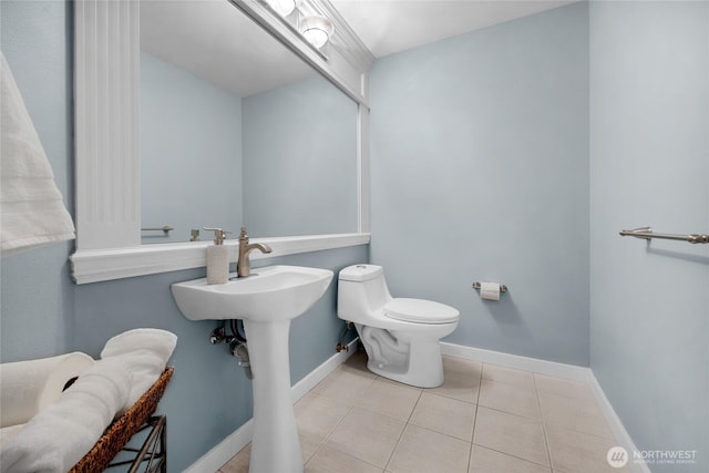 1401 241st St SE, Bothell, WA 98021 - bathroom with toilet, tile patterned flooring, and baseboards