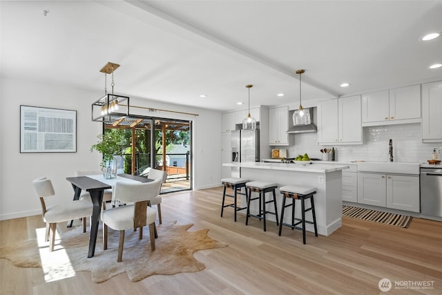 354 Summit Ave, Fircrest, WA 98466 - dining area featuring light wood finished floors, recessed lighting, and baseboards