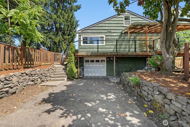 354 Summit Ave, Fircrest, WA 98466 - view of front facade featuring asphalt driveway, a garage, and stairway
