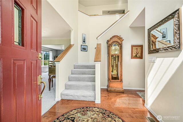 2470 Lee Way, Bellingham, WA 98226 - foyer featuring stairs, wood finished floors, and baseboards