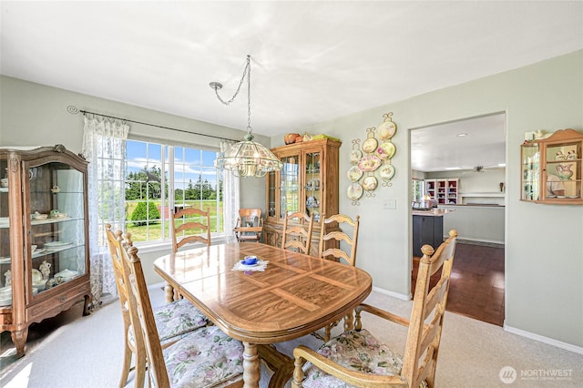 2470 Lee Way, Bellingham, WA 98226 - carpeted dining area with a chandelier and baseboards